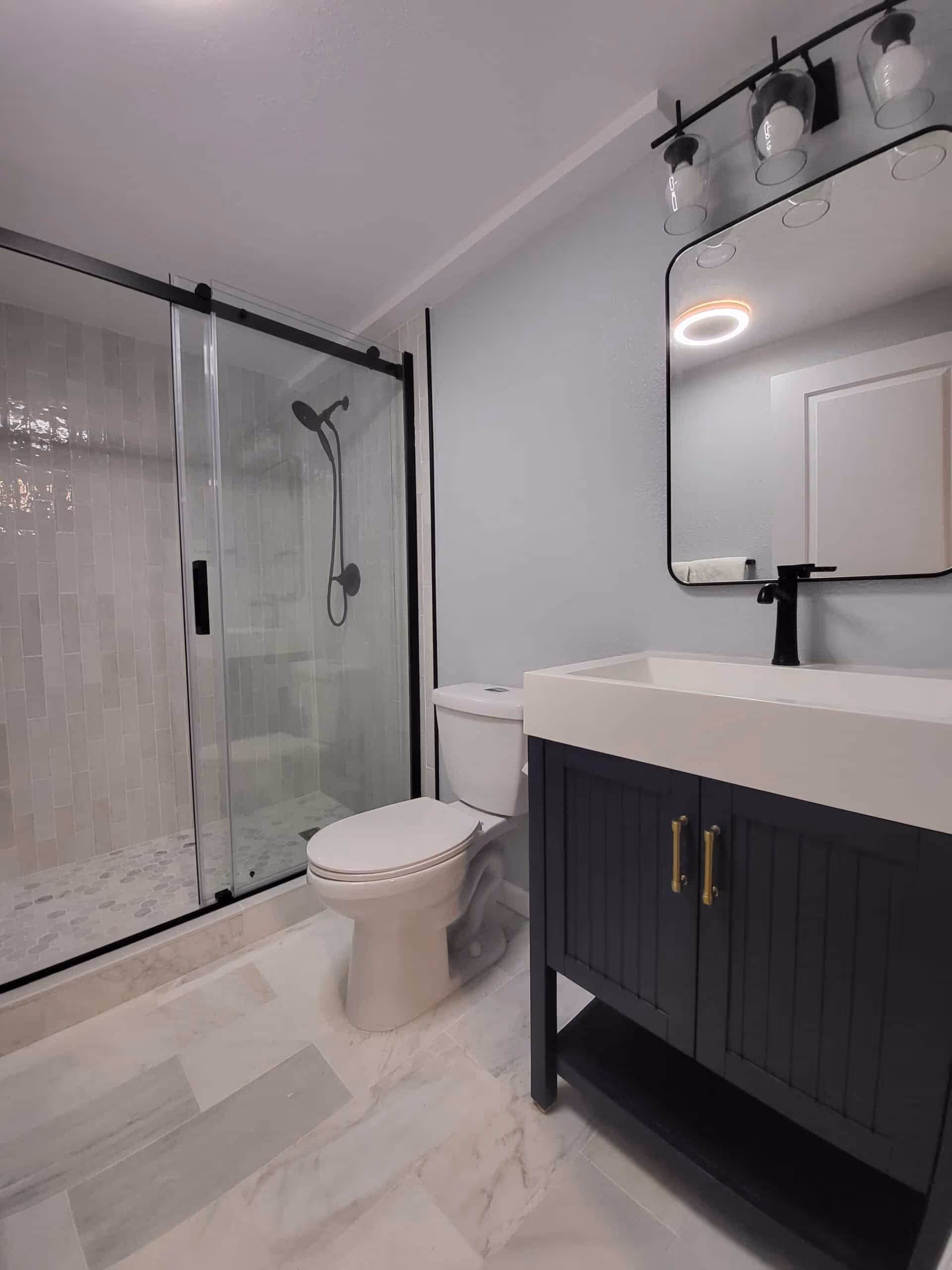 Basement remodel transformed into a bright and functional living space.