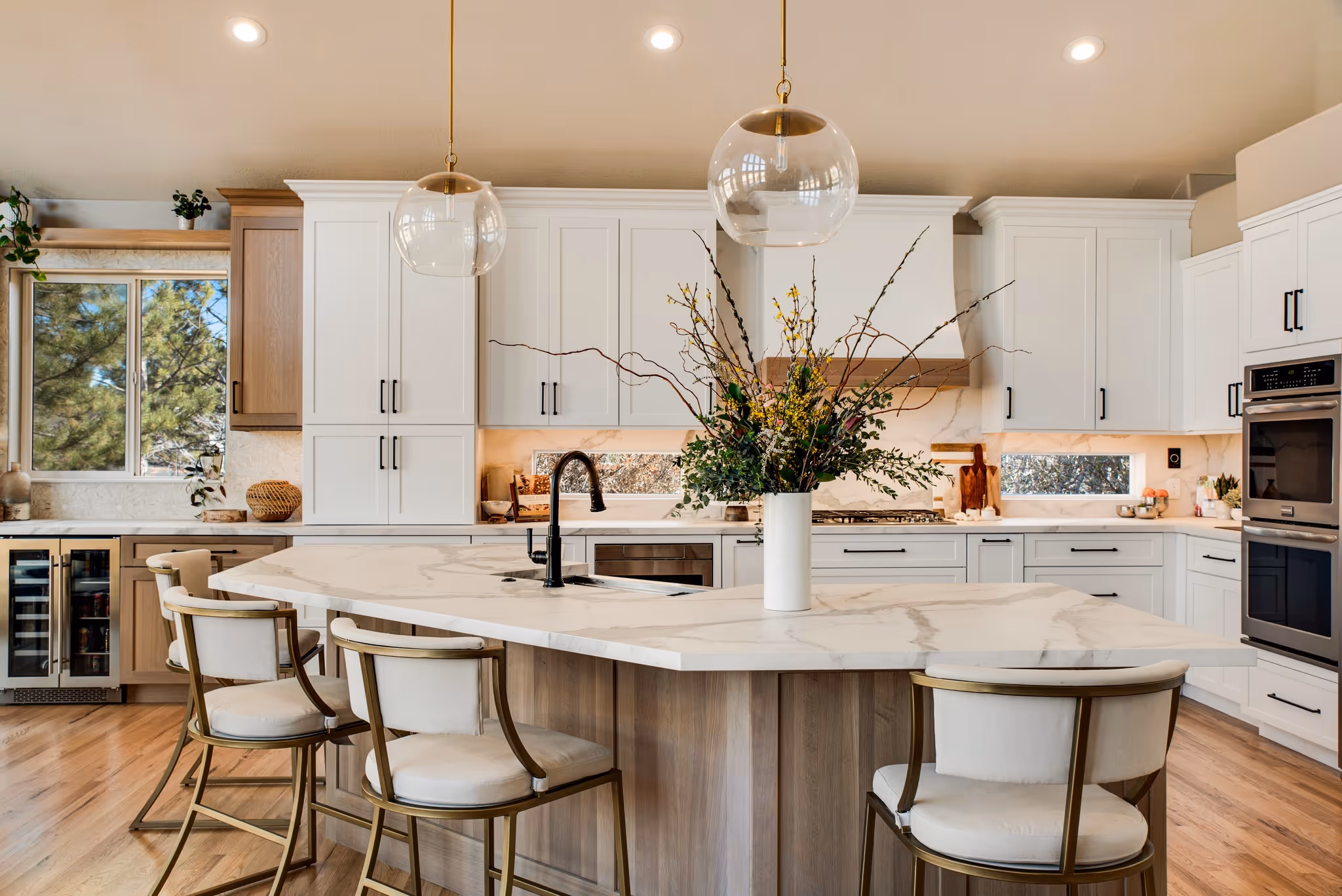 Satisfied homeowner smiling in their newly renovated kitchen by Home CPR.