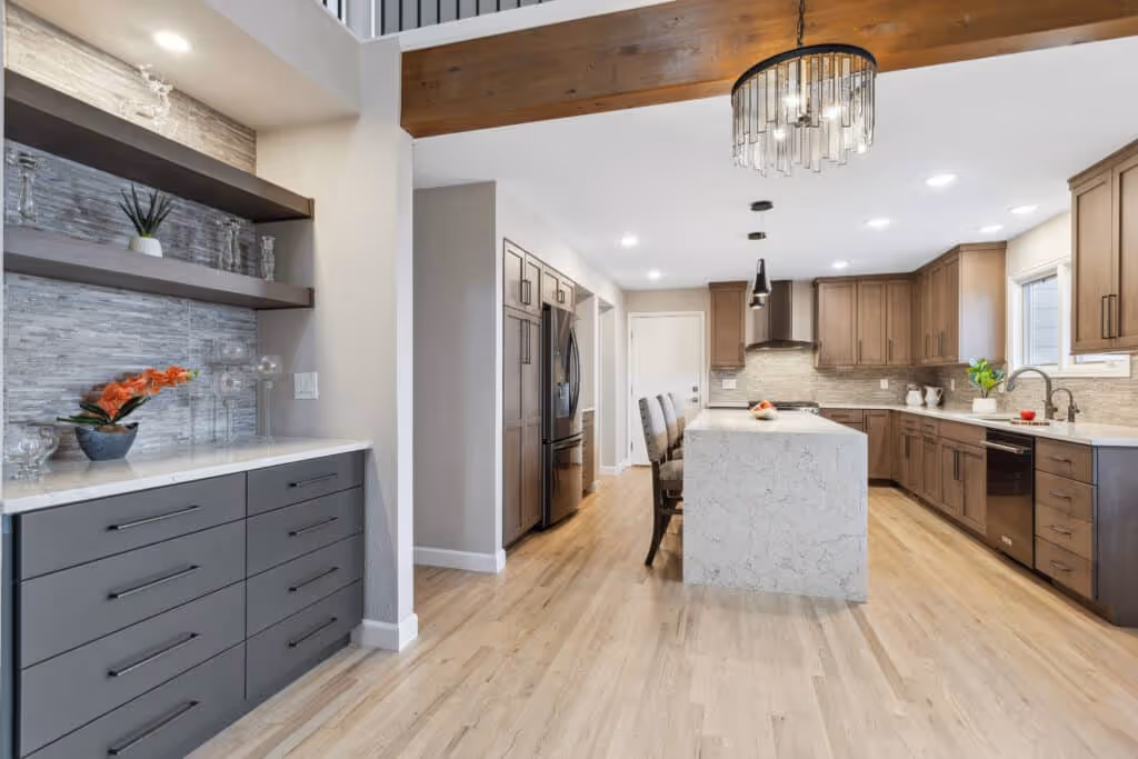 Custom built-in entertainment center and shelving unit in a living room remodel.