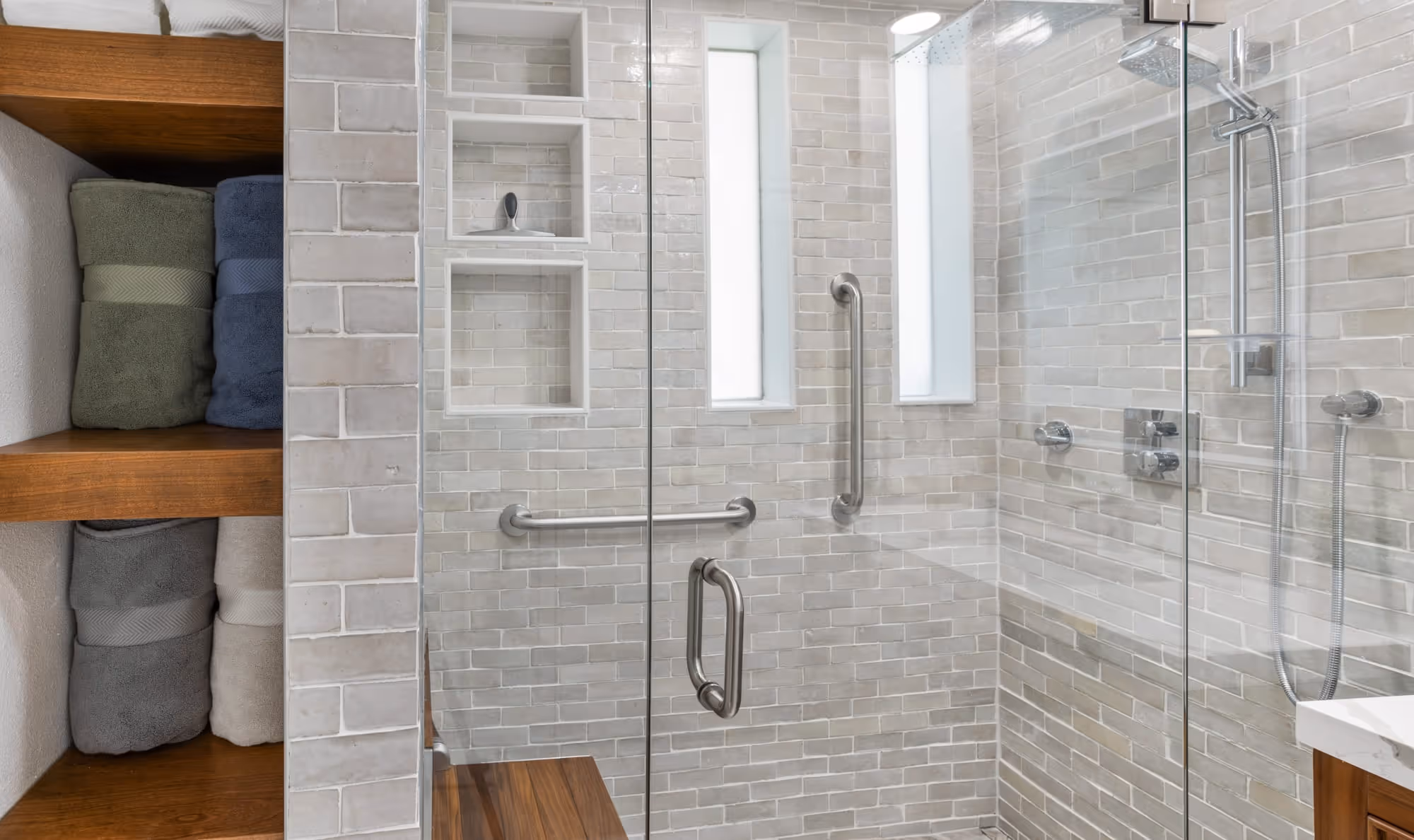 Spacious walk-in pantry with organized shelving and modern barn door.