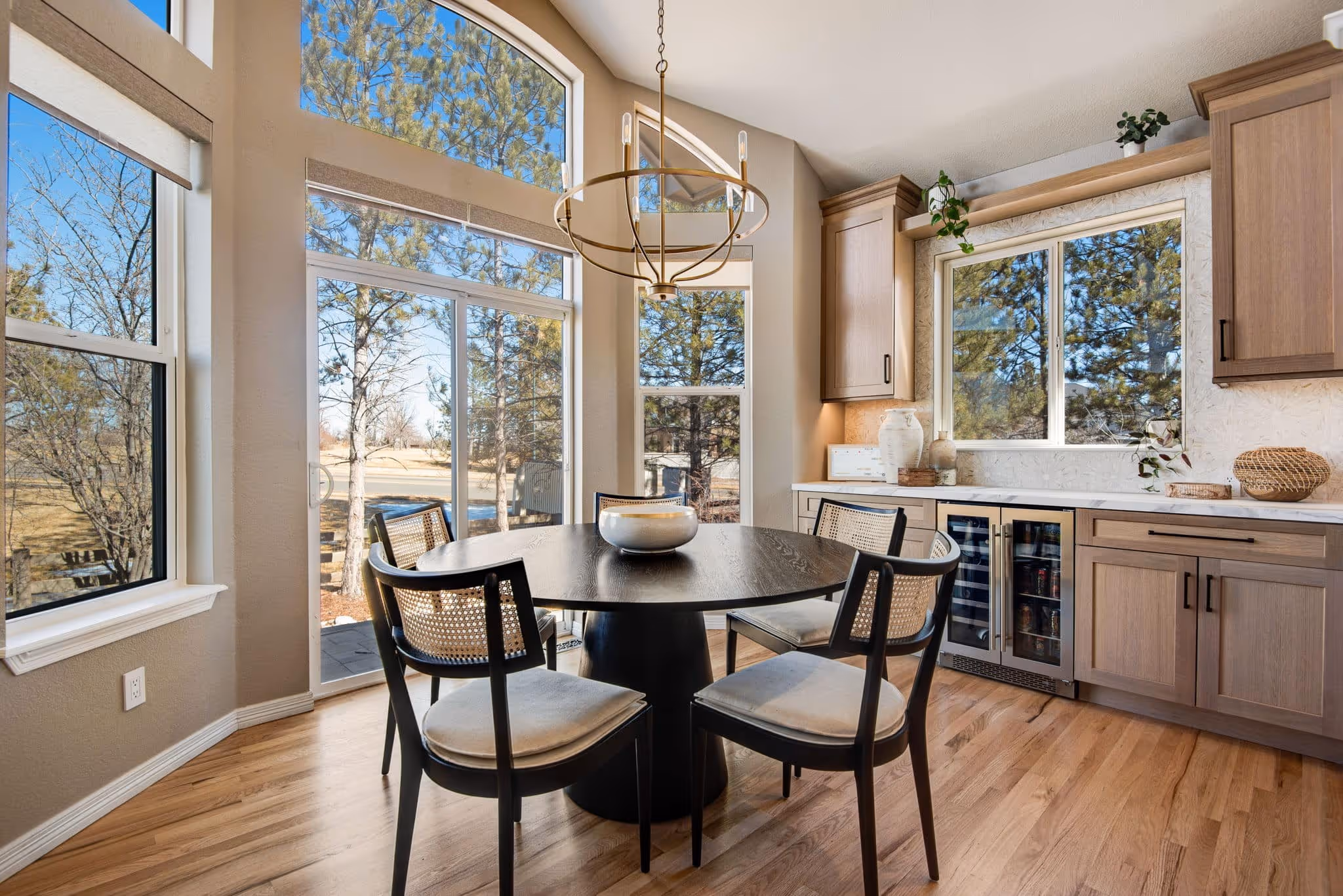 Spacious living and dining area with hardwood floors