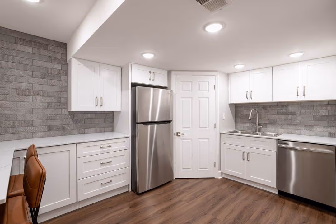 Kitchen with a subway tile backsplash