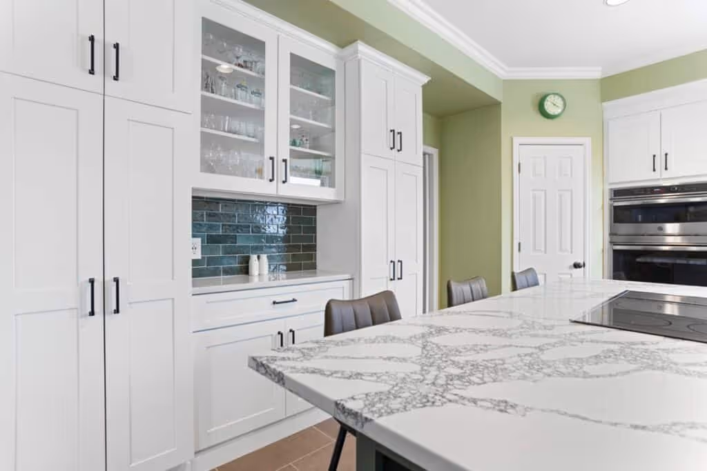 Modern kitchen remodel with custom cabinetry and finishes
